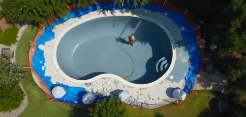 The shell is pressure washed and prepped with a bond coat to ensure long-lasting adhesion for your new PebbleTec surface.